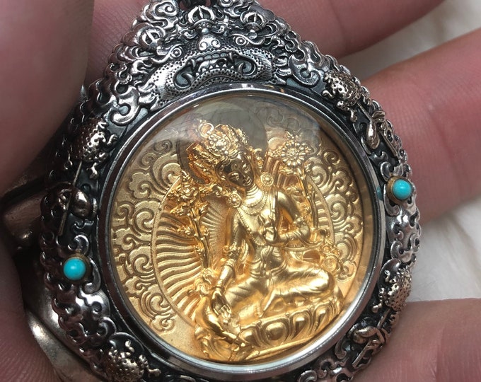 Tibetan Buddhist protection reliquary Tara in its green form in solid silver 925 plated gold 18k turquoise nan hong. wheel of life