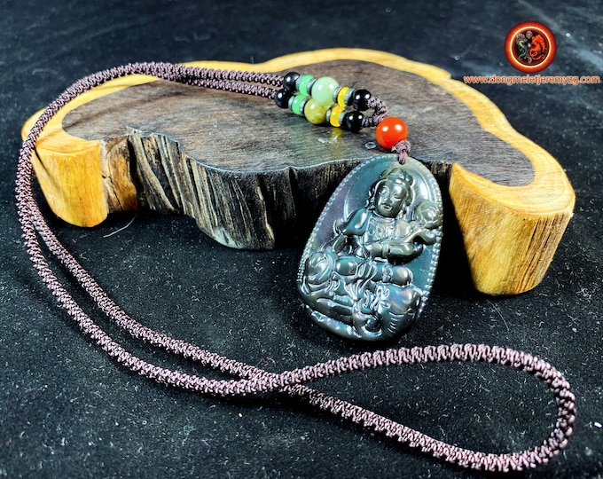 Buddha pendant, Samantabhadra . Buddhist amulet obsidian celeste eye. obsidian natural celeste eye from Mexico. Cord, jade.