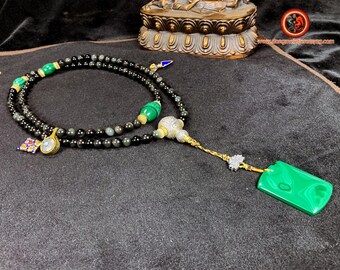 Mala, Buddhist rosary, Tibetan. 108 beads of obsidian eye celeste, malachite. Silver 925, 18k gold plated copper, turquoise, agate.