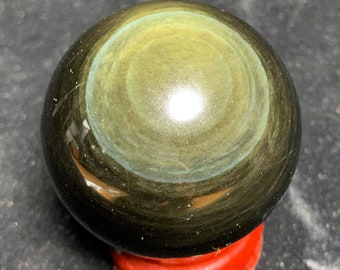 Obsidian sphere eye celeste quality A+. Mexico. Natural, exceptional work 0.245 kg 5.82 cm diameter