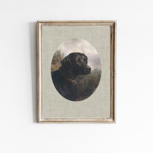 May include: A framed painting of a black Labrador Retriever in an oval portrait. The dog is looking to the right and has a serious expression. The background is a blurry landscape with green and brown tones.