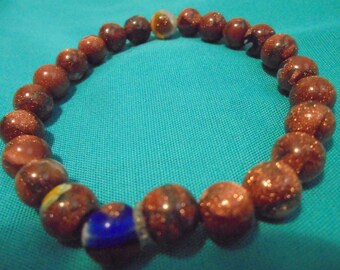 Very unique brown and colorful beaded bracelet