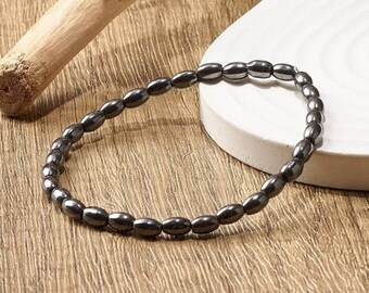 Bracelet Hématite Naturelle Extensible 18 cm ,Perles ovale 5,3 mm ,cordon silicone