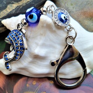 BIJOUX SAC A MAIN PORTE CLES TREFFLE EN STRASS BLEU TRES CHIC NEUF