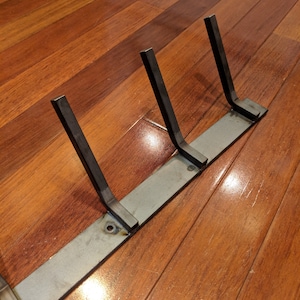 Putter headcover display rack