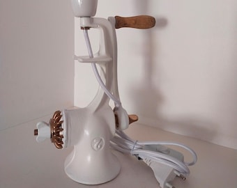 Diverted vintage meat grinder lamp