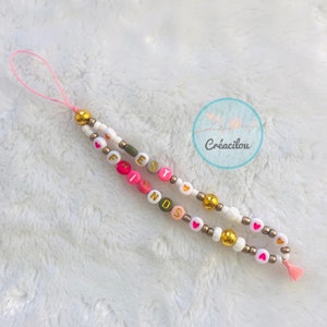SIERADEN / lanyard / hanger / accessoire voor mobiele telefoon - Vriendschap - Tekst "Best Friends" - Kralen en pompon - Roze, wit, gouden tinten