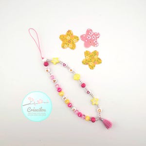 SIERADEN / band / hanger / accessoire voor TELEFOON - Positieve tekst "Life is beautiful" - Kralen, pompon - Wit, roze, gele tinten