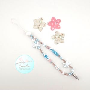 SIERADEN / lanyard / hanger / accessoire voor mobiele telefoon - Tekst "Enjoy Life" - Parels, schelpen - Wit, blauw, zilvertinten