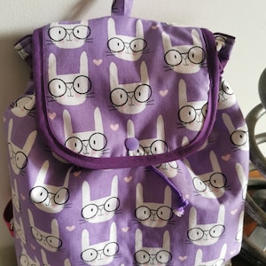 Backpack for small child from 5 to 7 years old, purple school bag &quot;head of cats with glasses&quot;