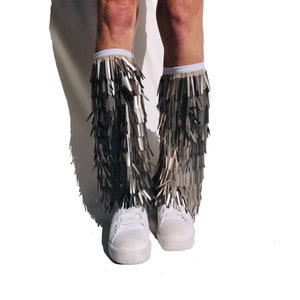Silver fringe sequined rave leg warmers, or boot covers.