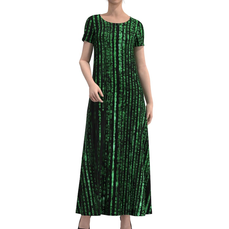 May include: A long black dress with a green digital rain pattern. The dress has short sleeves and a round neckline. The fabric features a vertical, code-like design in shades of green against a black background.