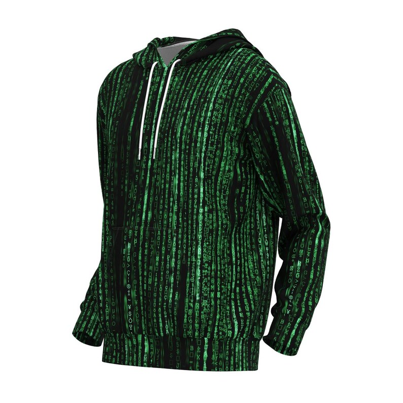 以下が含まれることがあります： 緑色のデジタルレインパターンが施された黒いパーカー。フード付きスウェットシャツには、ドローストリングとカンガルーポケットが付いています。デザインは、黒い背景に緑色の文字が繰り返されるパターンです。