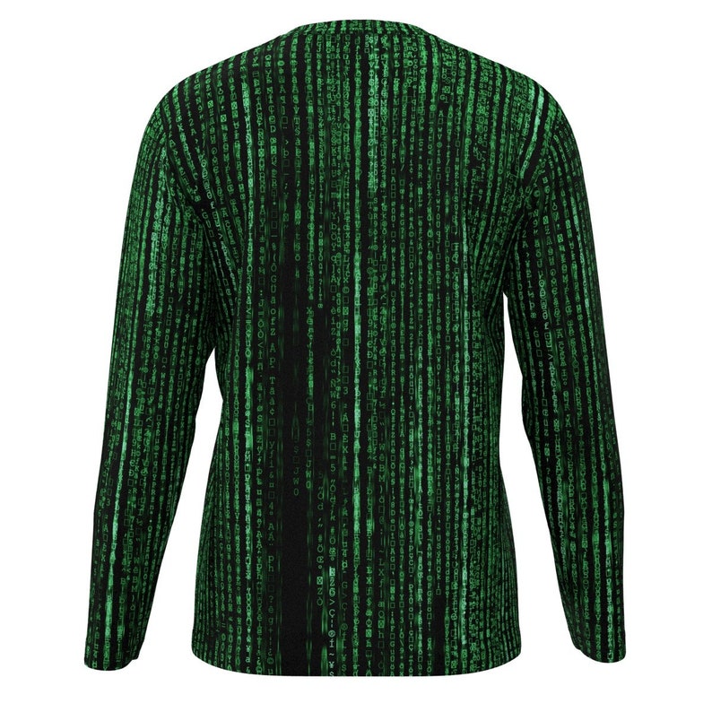 May include: Long-sleeved top with a black and green digital rain design. The pattern consists of vertical lines of green characters on a black backdrop, giving a tech-inspired look. The top has a crew neck and long sleeves.