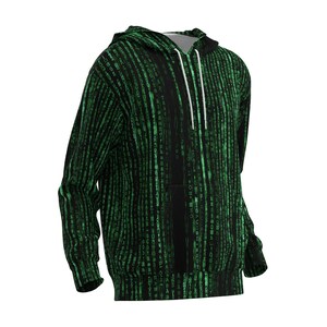 以下が含まれることがあります： 緑色のデジタルレインパターンが特徴の黒いパーカー。フード付きスウェットシャツにはフロントポケットと白いドローストリングが付いています。デザインは衣服全体を覆い、ユニークで人目を引く外観を作り出しています。