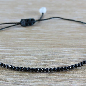 Adjustable bracelet with about 50 small Spinels - Black nylon thread - gift for her