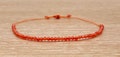 Carnelian Bracelet with av. 50 small gemstones - Orange nylon thread - Feminine stone - Minimalistic - Gift idea for her product logo
