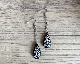 Black artisanal terracotta almond bead earrings