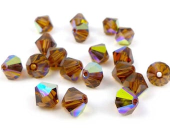 20 x Swarovski® crystal bicones 6 mm SMOKED TOPAZ AB