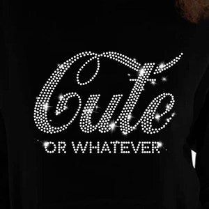 May include: Black hoodie with a rhinestone design that says "Cute or Whatever".