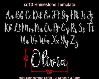 May include: A black background displays a rhinestone template with the alphabet in uppercase and lowercase. The name "Olivia" is spelled out in rhinestones. The template is 3.01 inches (76 mm) high and 6.10 inches (154 mm) wide.