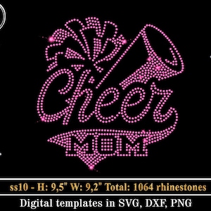 May include: Pink rhinestone design of a cheerleader with a megaphone and the text "Cheer Mom" on a black background. The design measures 9.5 inches tall and 9.2 inches wide and uses 1064 rhinestones.
