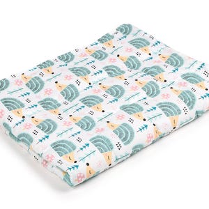a close up of a blanket on a white background