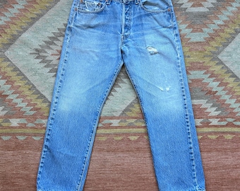 Y2K Levi's 501s 501xx Red Tab Button Fly Blue Vintage Denim Jeans Faded Straight Leg Medium Light Wash Frayed Holes / 33W 32 33x32