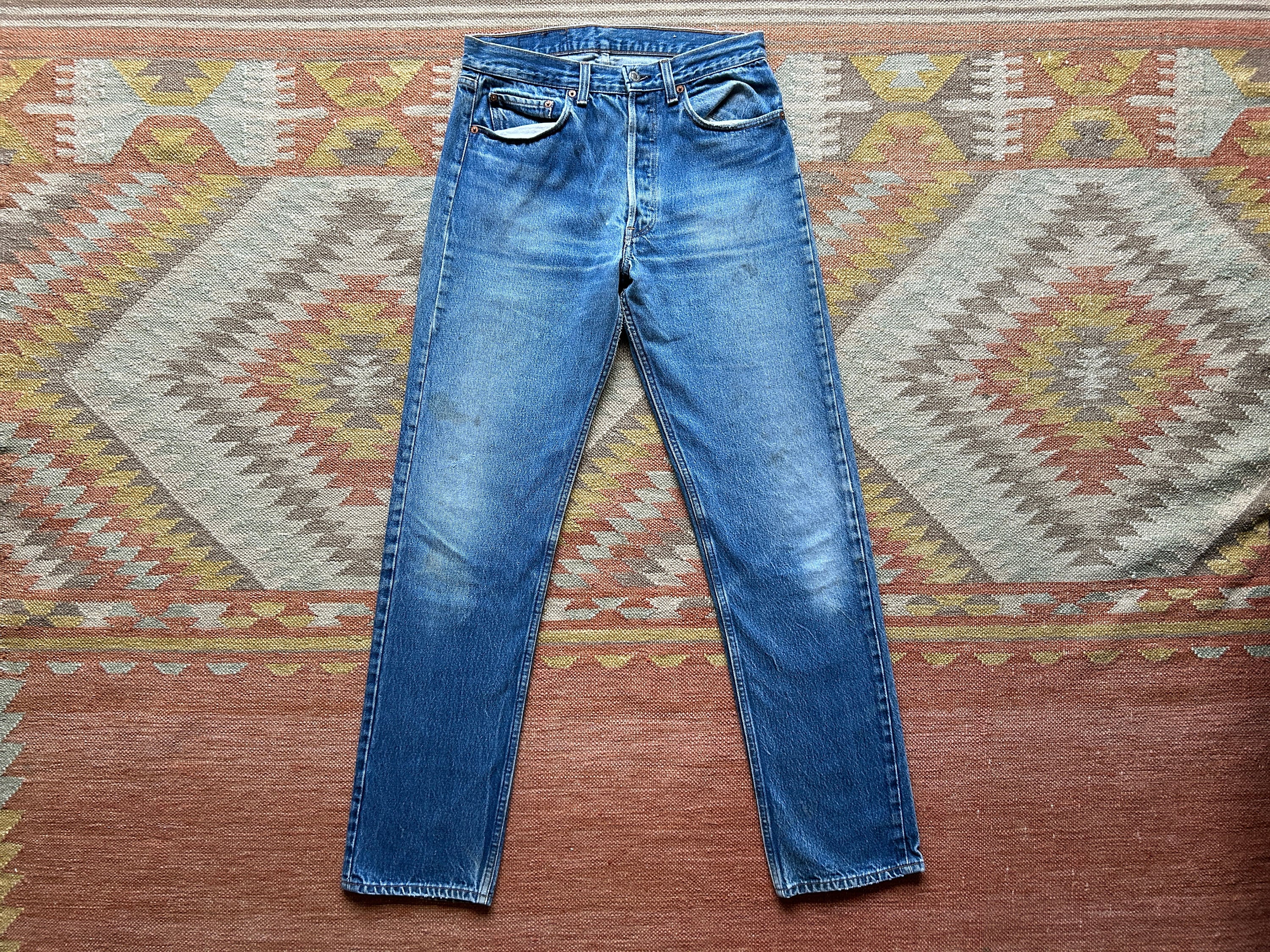 Stained Worn Jeans 