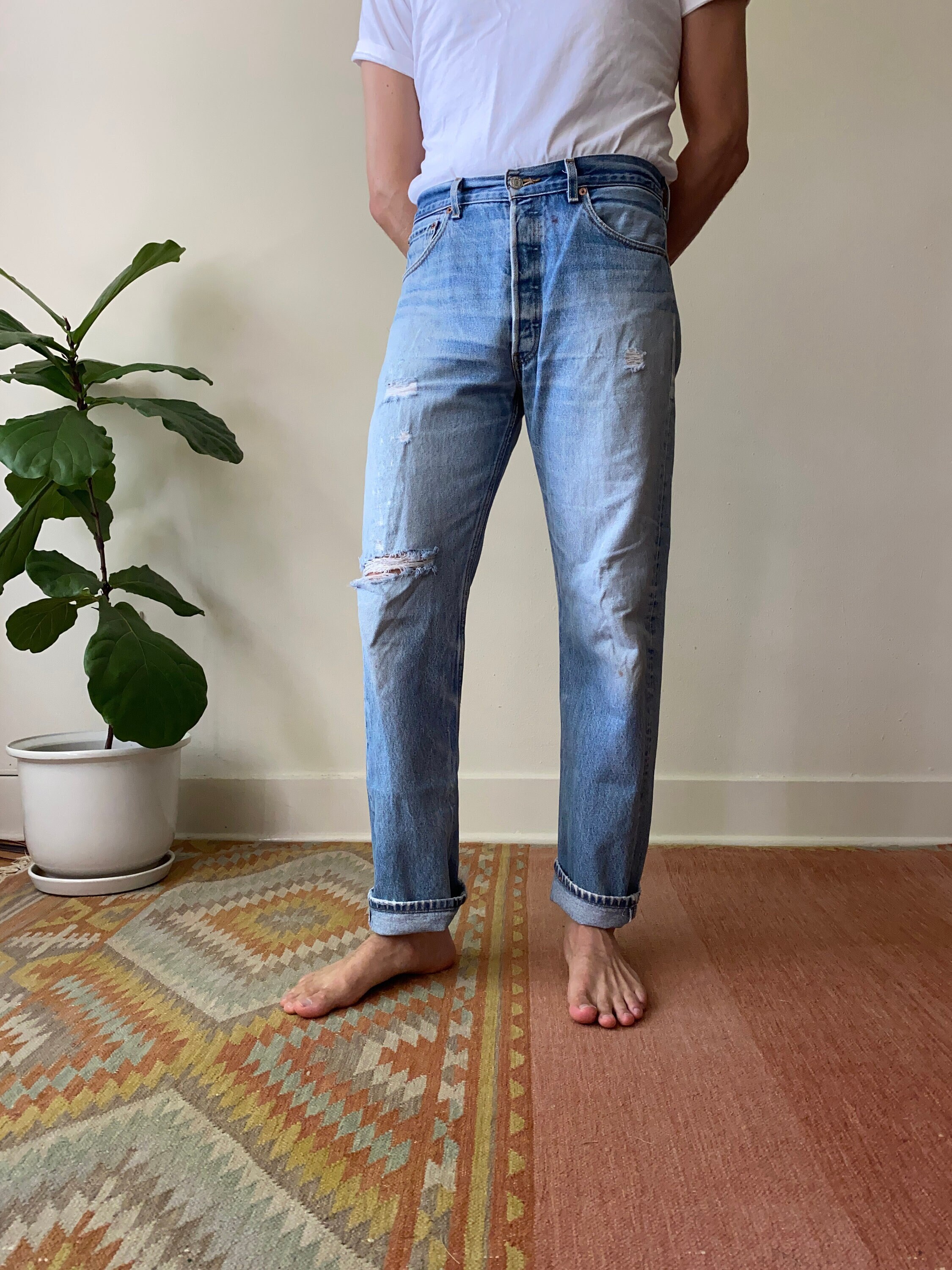 levi jeans with holes in the back