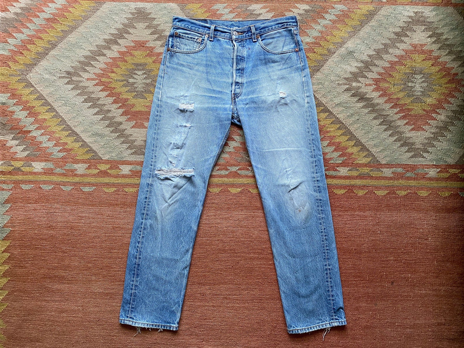 levi jeans with holes in the back