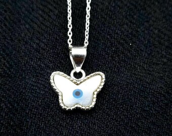 Collar de plata de ley con mariposa y ojo turco, colgante azul Nazar, joyería de protección.