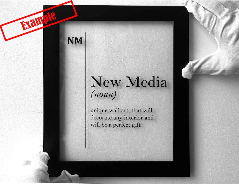May include: Black and white framed print with the text "New Media (noun)" and a definition: "unique wall art, that will decorate any interior and will be a perfect gift"
