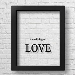 May include: Black framed wall art with a white brick background. The text "Do what you LOVE" is printed in black.