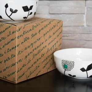 Set of hand-decorated white porcelain bowls. image 1