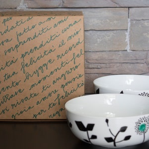 Set of hand-decorated white porcelain bowls. image 2