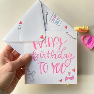 Biglietto compleanno bambina e ragazza scritto e disegnato a mano personalizzabile con disegni make-up.