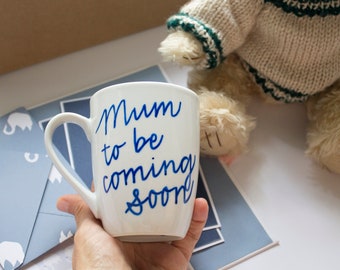 Hand personalized ceramic babyshower gift mug.