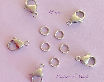 Pode incluir: Fechos e argolas de joalharia prateados dispostos sobre uma superfície lilás clara. Os fechos têm 11 mm. A imagem também inclui o texto "L'univers de Marie".