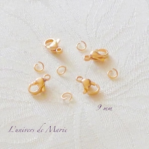 Peut inclure: Fermoirs à ressort dorés et anneaux de jonction pour la fabrication de bijoux. Les fermoirs mesurent 9 mm.