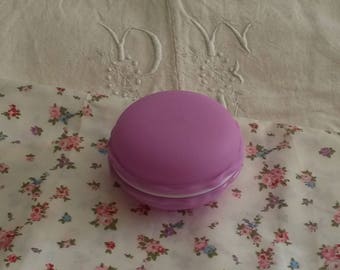 Purple round box shaped badge