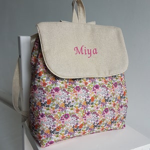 Sac à dos maternelle enfant personnalisable, cartable fille pour l'école, coton beige scintillant et liberty orange. Rentrée des classes