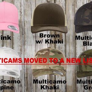 May include: A selection of trucker hats in various colors and camouflage patterns. The hats are available in pink, brown with khaki mesh, black multicam, white multicam, khaki multicam, and green multicam. The text "MULTICAMS MOVED TO A NEW LISTING" is displayed across the image.