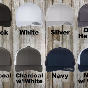 A collection of custom Retro hats. The collection includes colors: Black, charcoal, white, dark heather, charcoal w/ white, navy, navy w/ white and silver