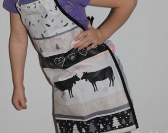 Coated 100% cotton apron for child type patterned mountain 4-8 years