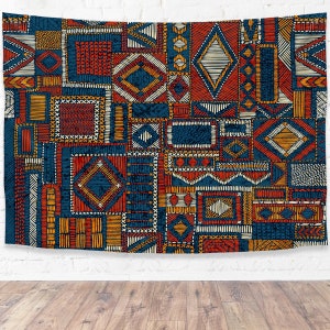 May include: A tapestry with a geometric pattern in shades of blue, orange, red, and yellow. The pattern is made up of squares and diamonds.