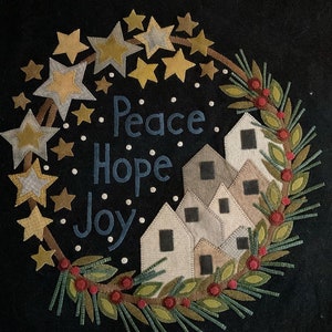 Nur Muster! Peace, Hope & Joy Applikation aus Wolle