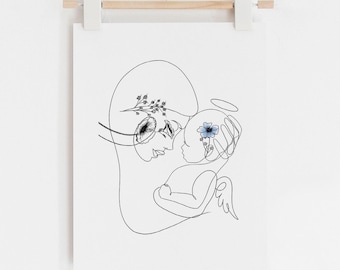 May include: A black and white line art print of a mother holding a baby. The baby has a halo and a flower behind its head. The print is on a white background and is hanging on a wooden hanger.