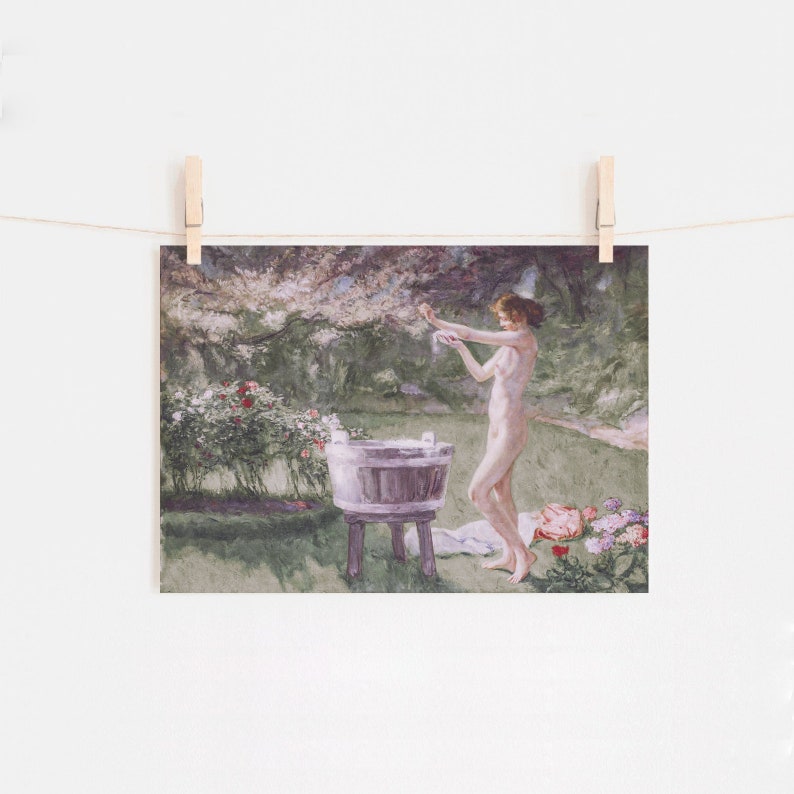 A vintage painting with pinks and green hues of a woman bathing in a meadow.