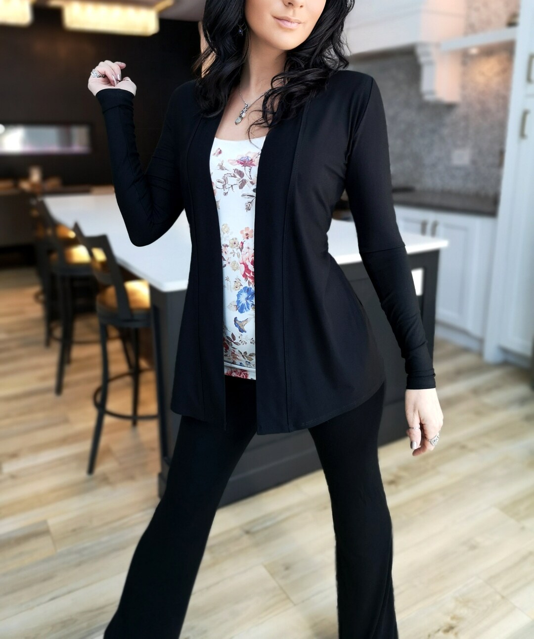 Fitted Black cardigan.